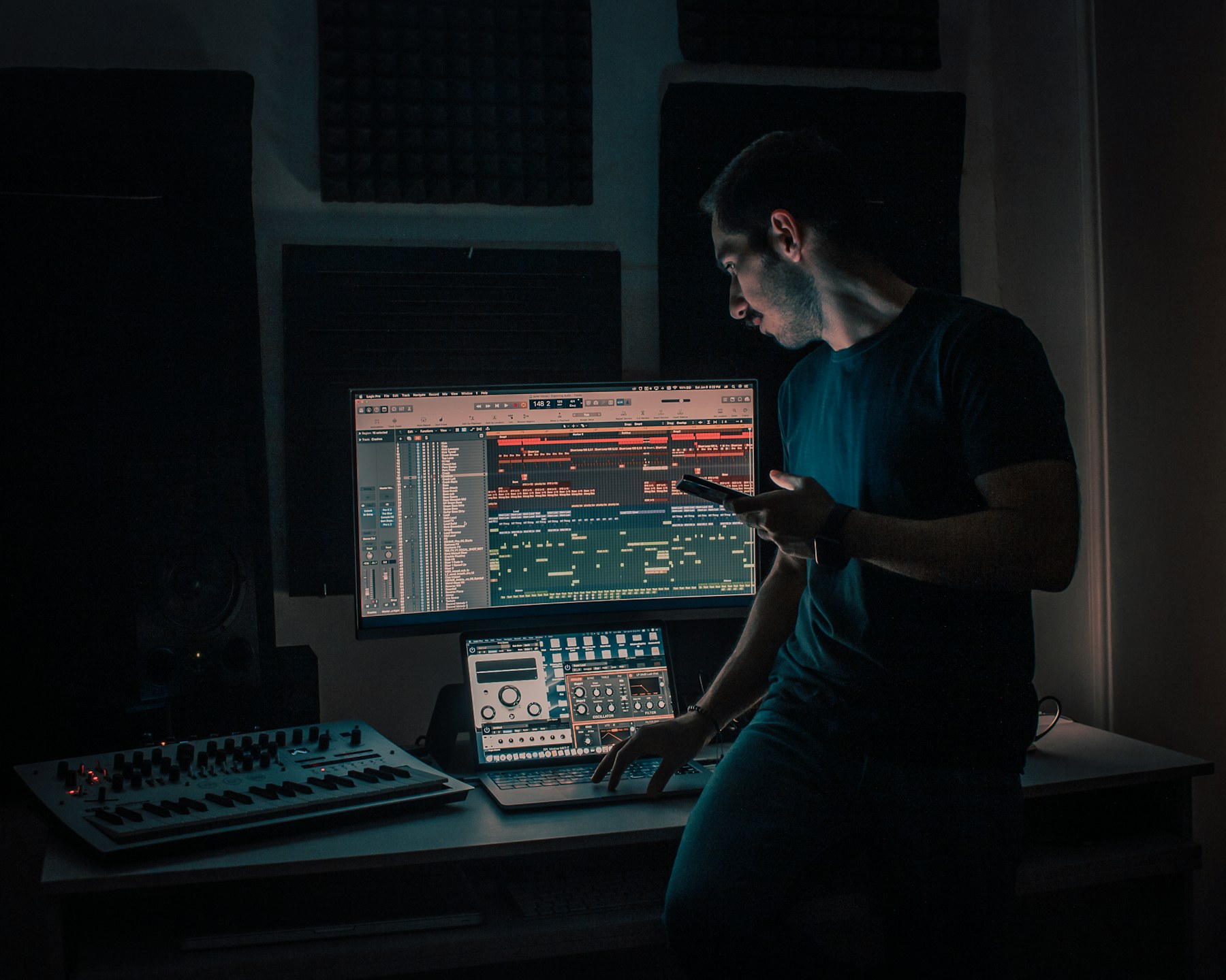 Music producer working at a production desk